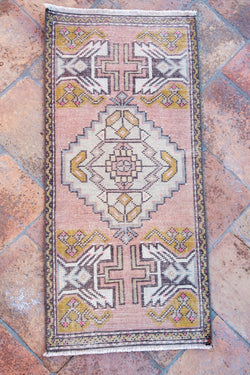 Small Vintage Antiqued Turkish Carpet Tierra del Lagarto